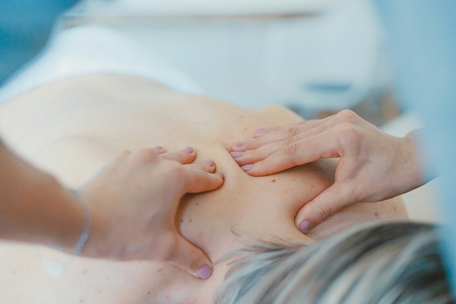 Massaging another person's back